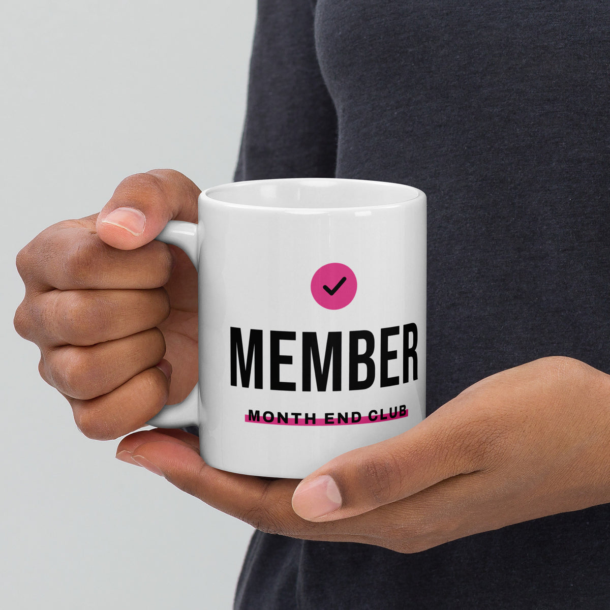Member Mug – pink print, in hand